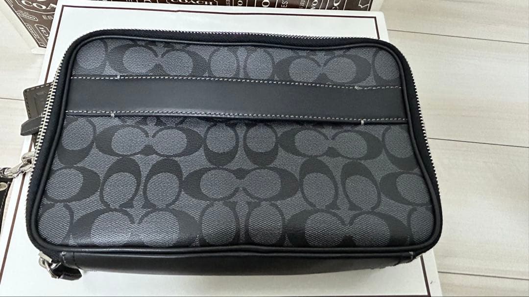 COACH ブラック ロゴパターン バッグ