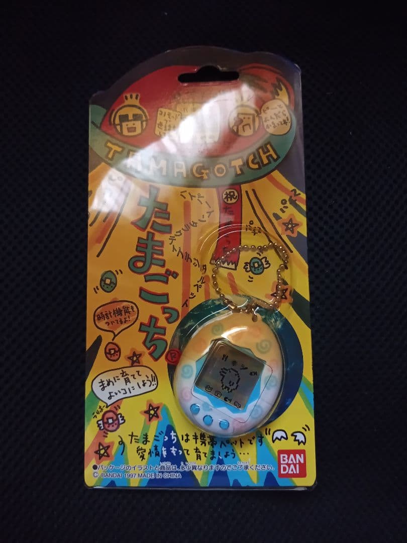 初代　たまごっち　希少ホワイト渦巻きプリント